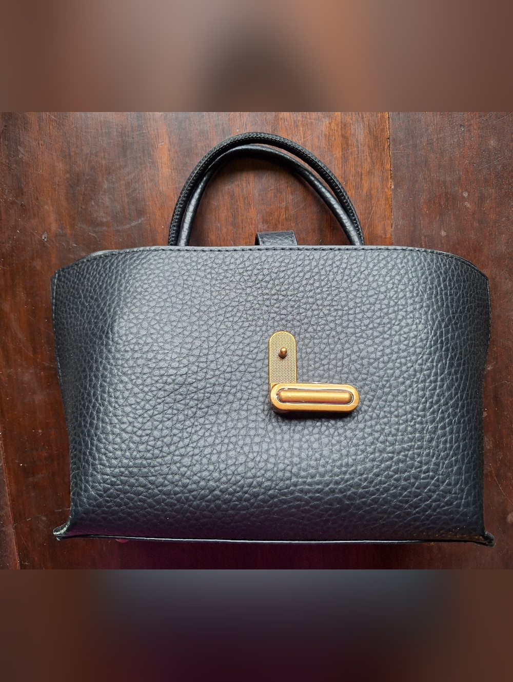 Black Pebbled Leather Top-Handle Bag with Gold Hardware